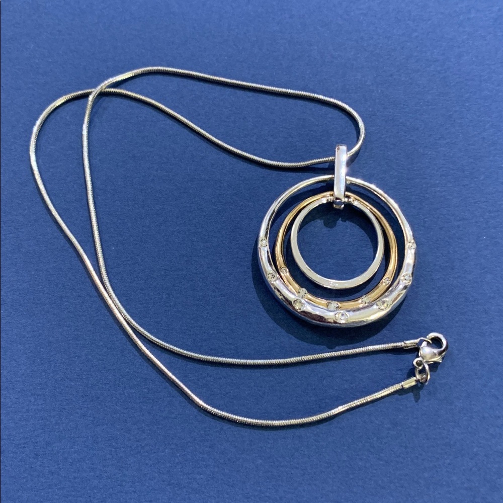 Gold and silver tone 1.5” pendant w crystals on 16” serpentine necklace